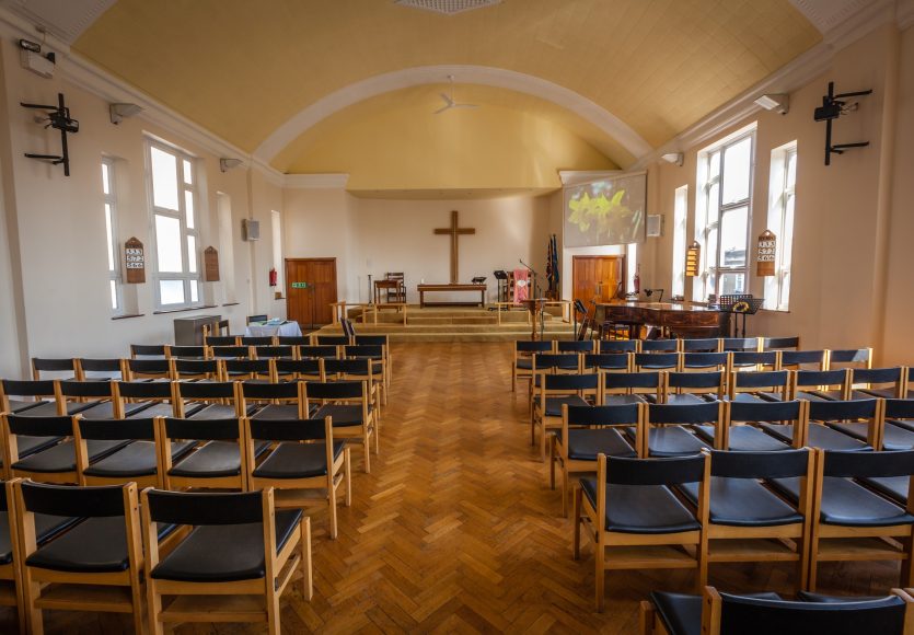 Empty chairs in the church